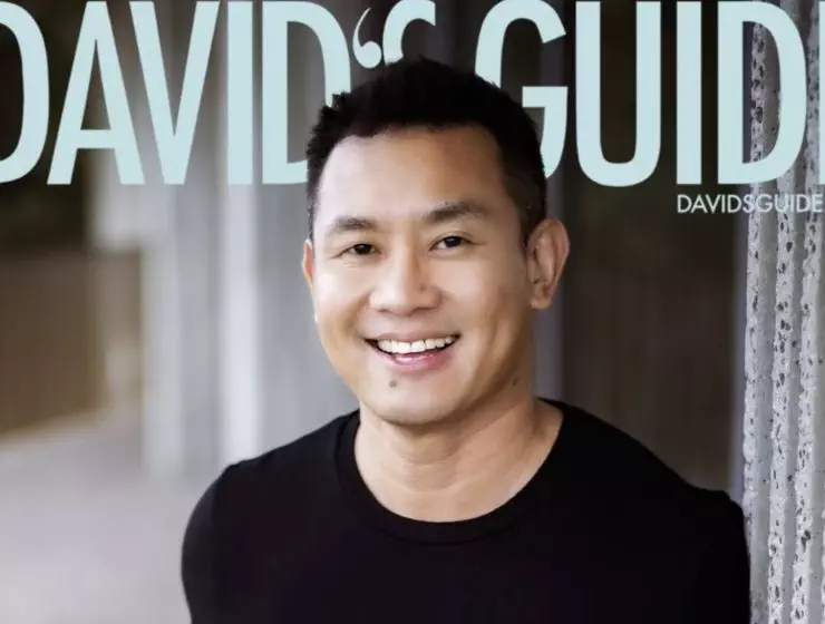 The image shows a smiling man with text overlay that reads DAVID'S GUIDE alongside a web address.